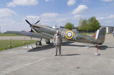 Harry standing in front of Spitfire