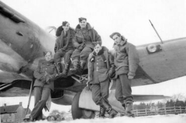 Harry (2nd from right) with fellow pilots Jan' 41 sitting on Bolton Paul Defiant